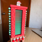 Calendario de Adviento con chimenea y Papá Noel